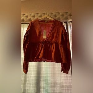 Anama burnt orange long sleeve deep v neck blouse | size medium